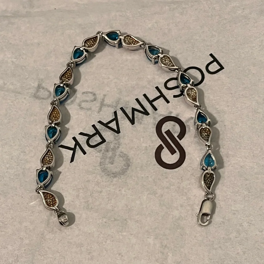 LOVED AUTHENTIC LONDON BLUE TOPAZ STONES/BLUE FIRE OPAL STERLING SILVER BRACELET